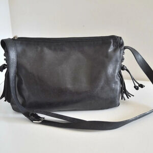 Tanner leather cross body bags